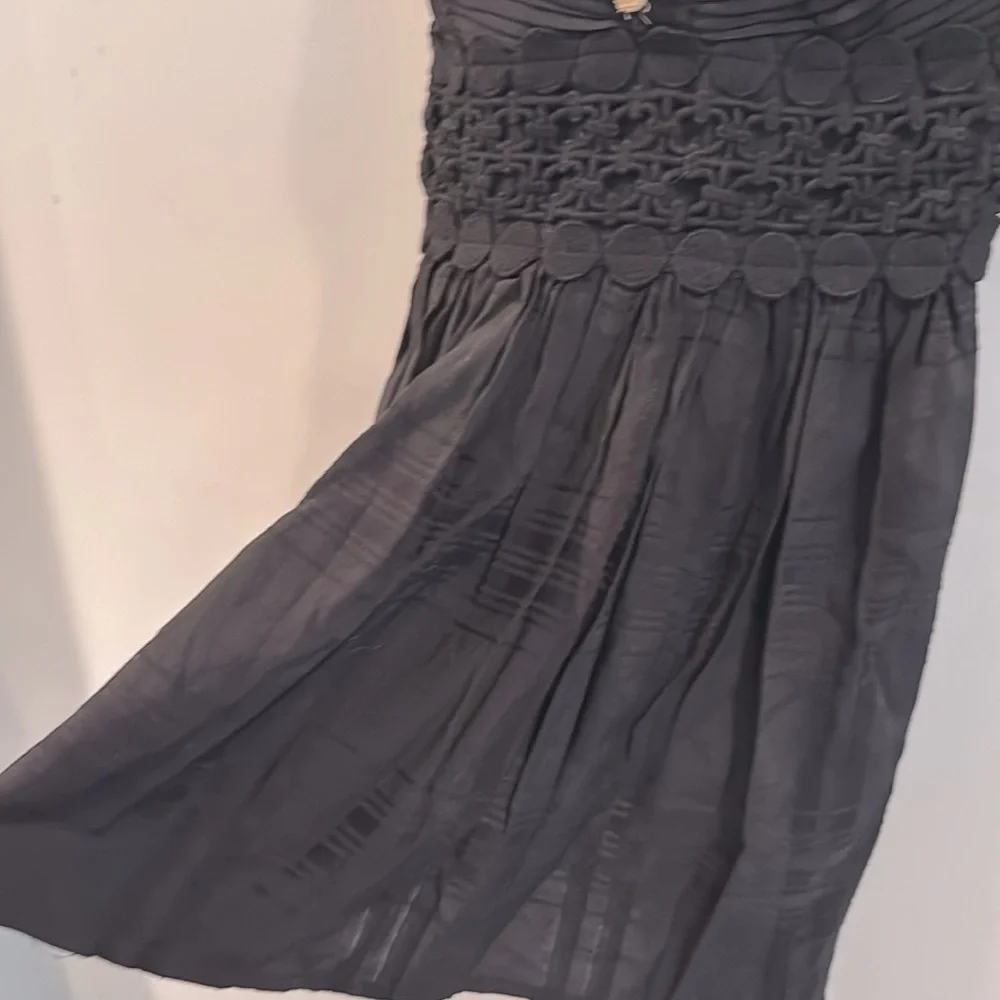 XOXO | Black Sleeveless Top w/ Lace, Bow & Wood Flower Button Detail - Picture 4 of 12